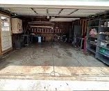 Cluttered storage area before cleanup